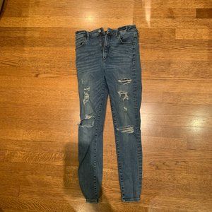 Tight ripped high waisted dark blue jeans from abercrombie and fitch